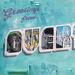 A mural which reads, 'Greetings from Overtown.'