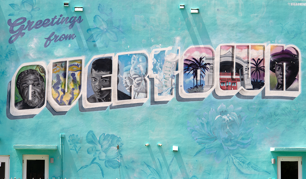 A mural which reads, 'Greetings from Overtown.'